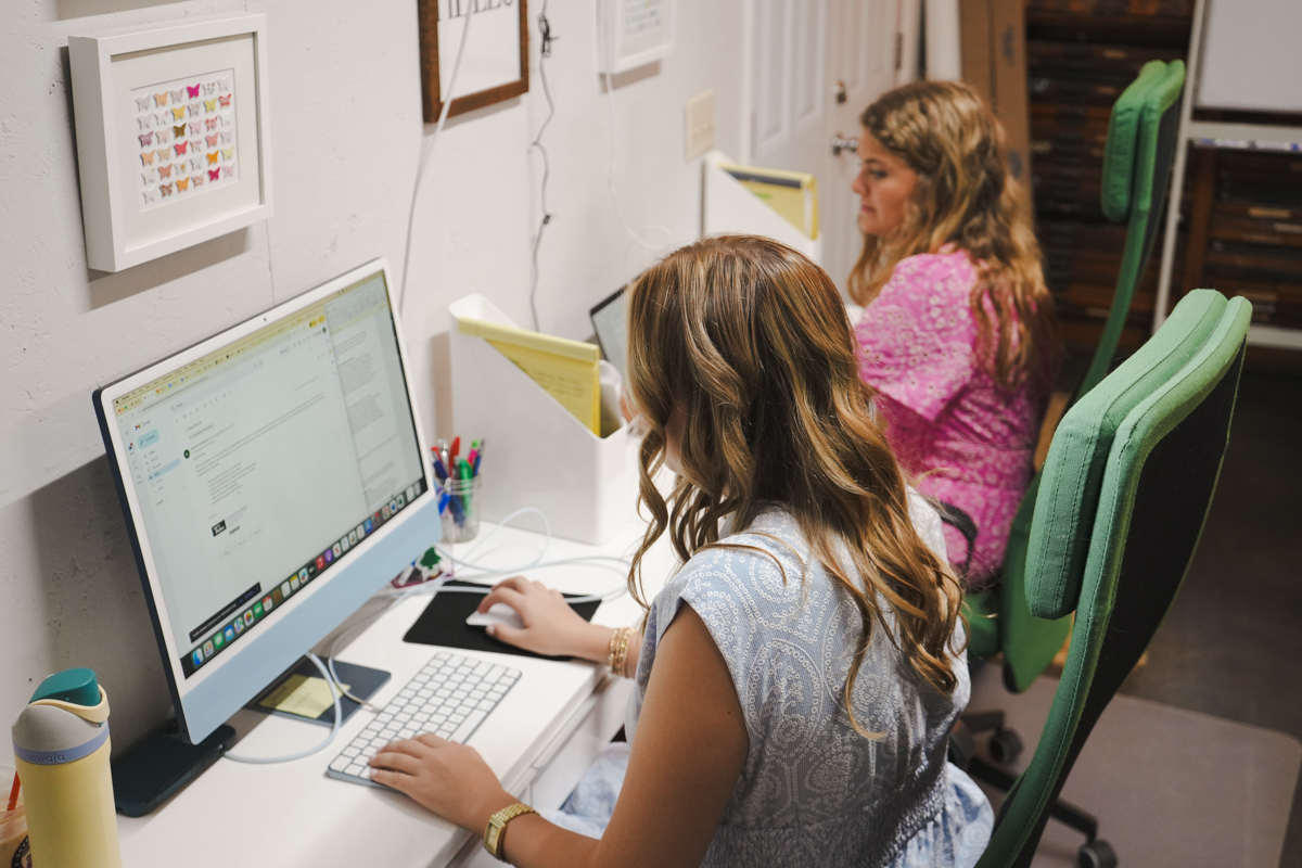 TRINDGROUP marketing PR interns at their desks working on their computers.